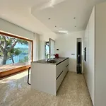 Appartement Modern And Elegant With A Spacious Sea View Terrace Overlooking Palmaria Island Bright Designer Interiors Fully Equipped Up To 6 Guests Private Parking Aircon The Comforts For A Perfect Porto Venere