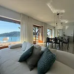 Modern And Elegant With A Spacious Sea View Terrace Overlooking Palmaria Island Bright Designer Interiors Fully Equipped Up To 6 Guests Private Parking Aircon The Comforts For A Perfect