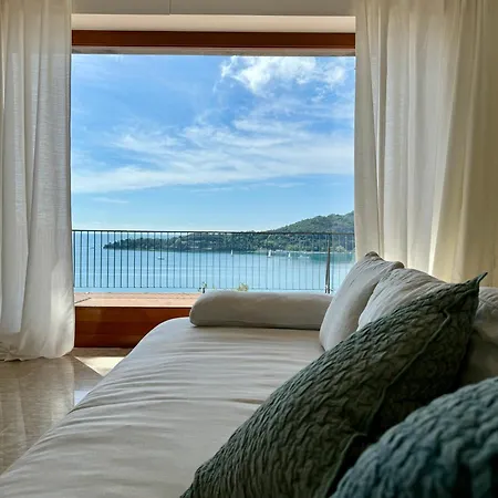 Modern And Elegant With A Spacious Sea View Terrace Overlooking Palmaria Island Bright Designer Interiors Fully Equipped Up To 6 Guests Private Parking Aircon The Comforts For A Perfect Porto Venere