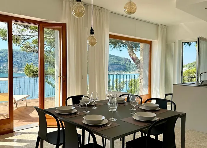 Modern And Elegant With A Spacious Sea View Terrace Overlooking Palmaria Island Bright Designer Interiors Fully Equipped Up To 6 Guests Private Parking Aircon The Comforts For A Perfect * Porto Venere