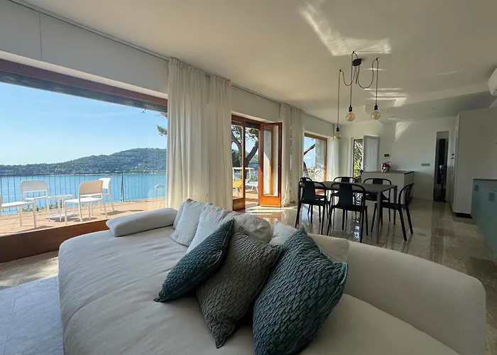 Modern And Elegant With A Spacious Sea View Terrace Overlooking Palmaria Island Bright Designer Interiors Fully Equipped Up To 6 Guests Private Parking Aircon The Comforts For A Perfect