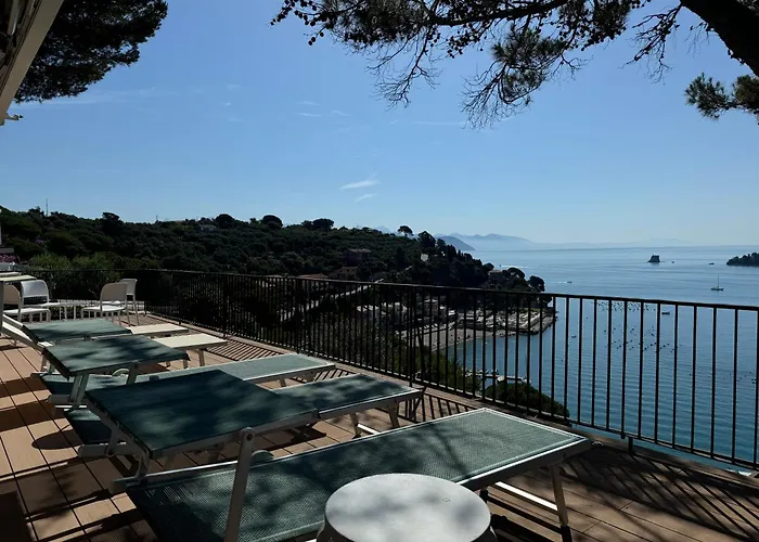 Modern And Elegant With A Spacious Sea View Terrace Overlooking Palmaria Island Bright Designer Interiors Fully Equipped Up To 6 Guests Private Parking Aircon The Comforts For A Perfect Porto Venere