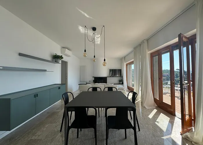 Modern And Elegant With A Spacious Sea View Terrace Overlooking Palmaria Island Bright Designer Interiors Fully Equipped Up To 6 Guests Private Parking Aircon The Comforts For A Perfect Lejlighed Porto Venere
