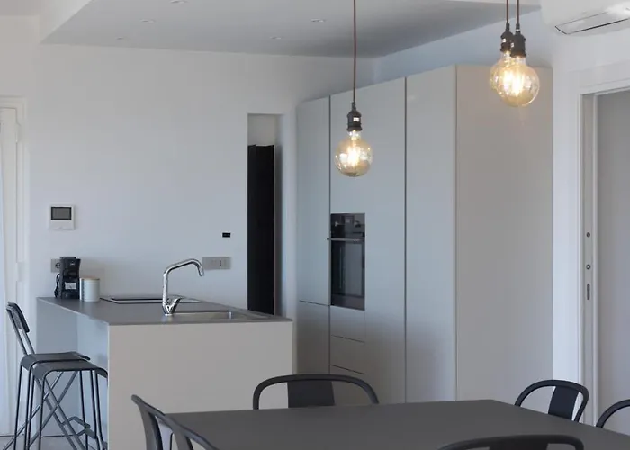Modern And Elegant With A Spacious Sea View Terrace Overlooking Palmaria Island Bright Designer Interiors Fully Equipped Up To 6 Guests Private Parking Aircon The Comforts For A Perfect Appartamento Porto Venere
