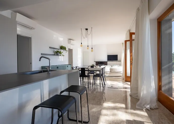 Modern And Elegant With A Spacious Sea View Terrace Overlooking Palmaria Island Bright Designer Interiors Fully Equipped Up To 6 Guests Private Parking Aircon The Comforts For A Perfect Appartamento Porto Venere