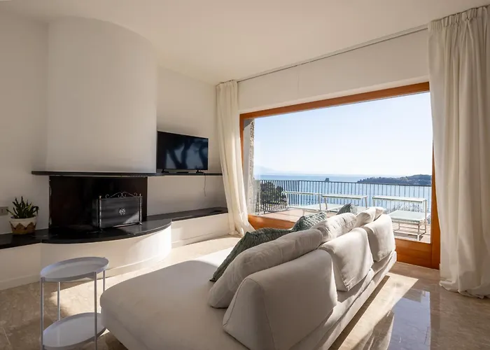 Modern And Elegant With A Spacious Sea View Terrace Overlooking Palmaria Island Bright Designer Interiors Fully Equipped Up To 6 Guests Private Parking Aircon The Comforts For A Perfect